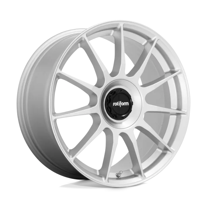 A silver alloy wheel with a multi-spoke design, featuring a black center cap displaying the text "rotiform." The wheel is standing upright on a plain white background.