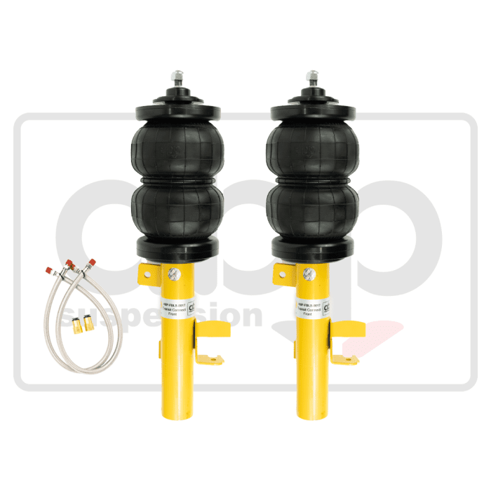 Two cylindrical air springs with black rubber bladders and yellow bases. Accompanied by two coiled hoses with brass fittings. Background features a logo with the text, "KNP FELS 0017 - Front."